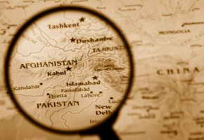 magnifying glass over afghanistan