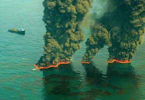 Controlled burns were part of the effort to reduce the amount of oil in the Gulf. Photo, from May 19, 2010, courtesy of John Kepsimelis, U.S. Coast Guard.