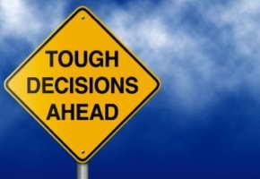 tough decisions ahead sign