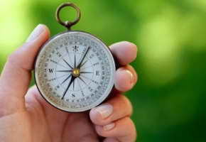 compass in hand