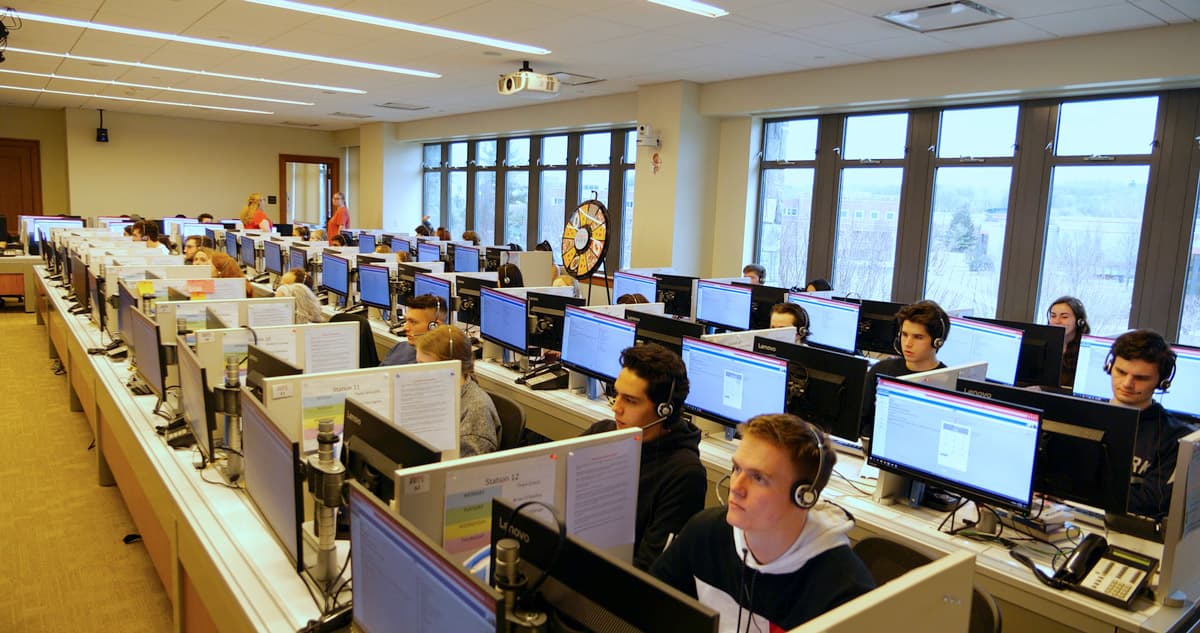 Photo of students working in the Marist Poll phone room