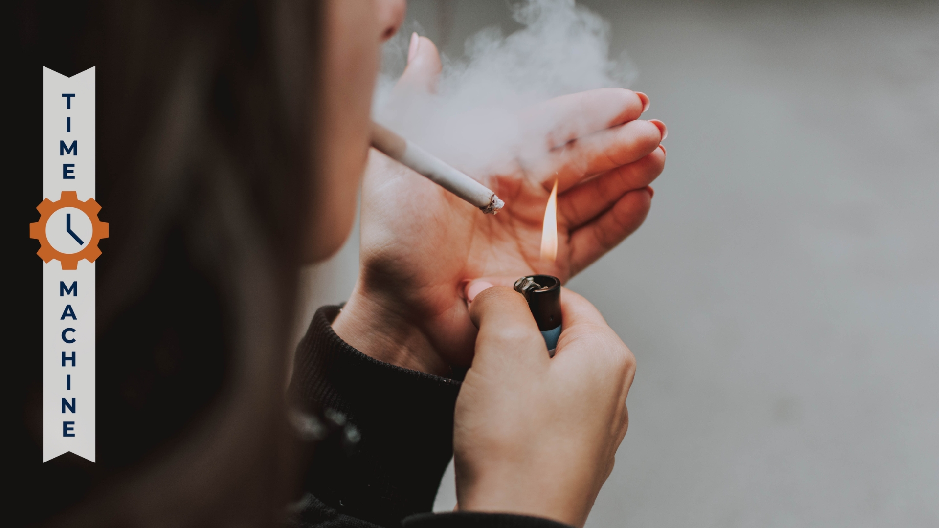 Woman lighting a cigarette